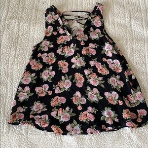 Black sleeveless blouse with pink flowers